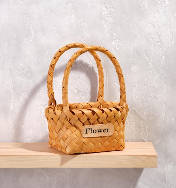 Stylish wicker basket for spring flowers floral decorative arrangements or fruits