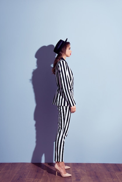 Stylish woman posing with hat