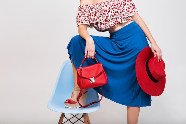 Stylish woman in summer outfit isolated posing in fashion trend isolated