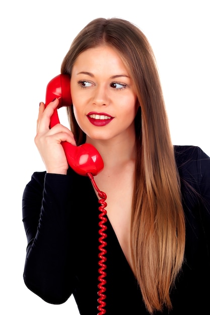 Foto donna alla moda con un telefono rosso