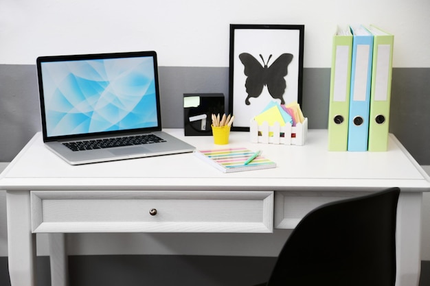 Photo stylish workplace with laptop at home