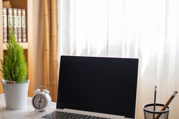 Stylish Workspace With Desktop Computer Office Supplies And Houseplant