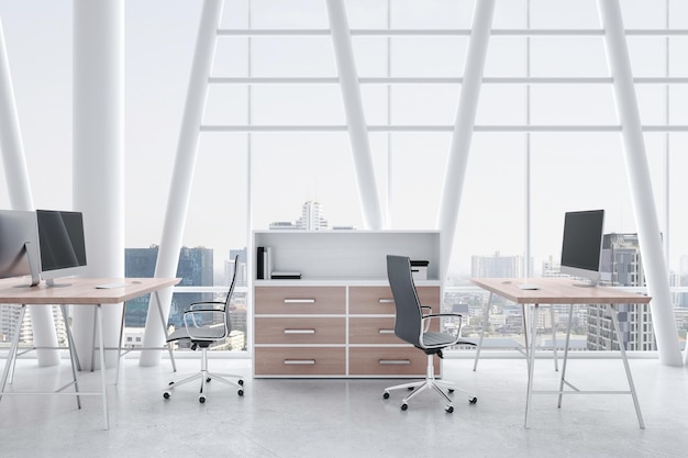 Stylish workspaces with natural wooden details table surface\
and filing cabinet modern computers light concrete floor and huge\
window with white decorative pillars 3d rendering