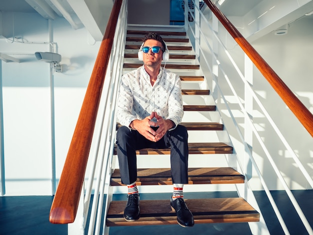 Stylish, young man on the deck