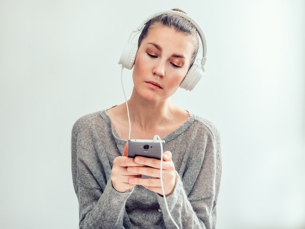 stylish, young woman in headphones