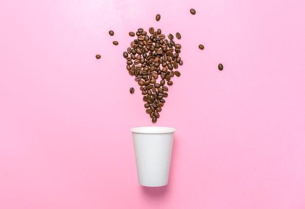 Styrofoam cup and coffee beans