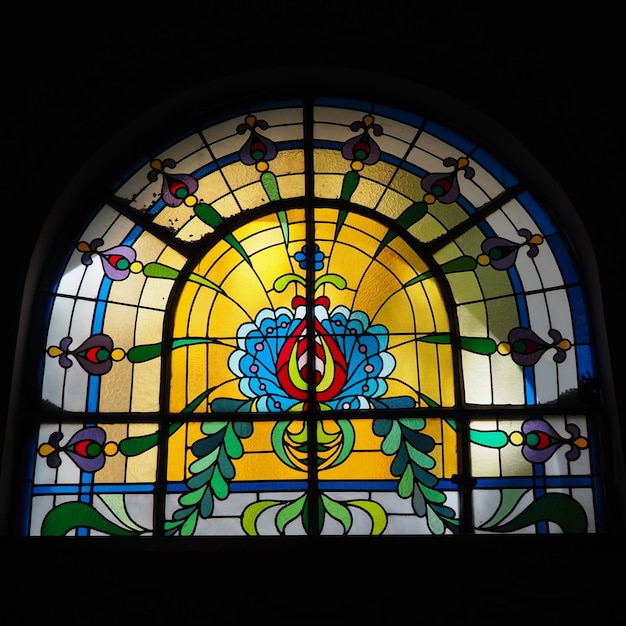 Subotica Serbia September 12 2021 Vintage colorful Stained glass windows in the synagogue Glass with pictures or colored patterns Floral geometric and religious motifs