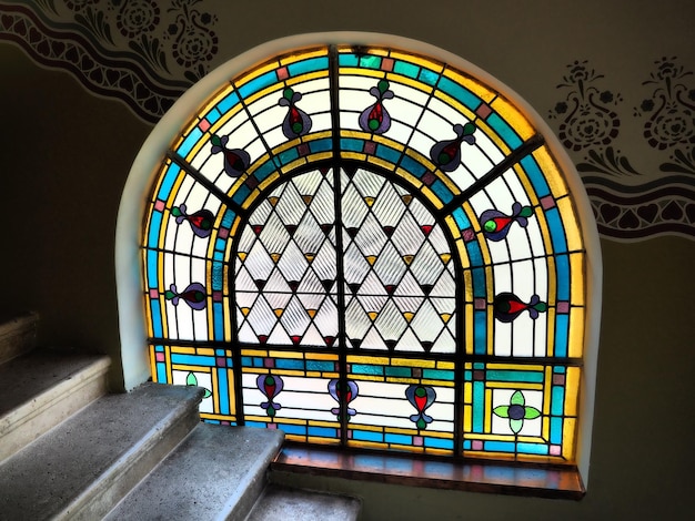 Subotica Serbia September 12 2021 Vintage colorful Stained glass windows in the synagogue Glass with pictures or colored patterns Floral geometric and religious motifs