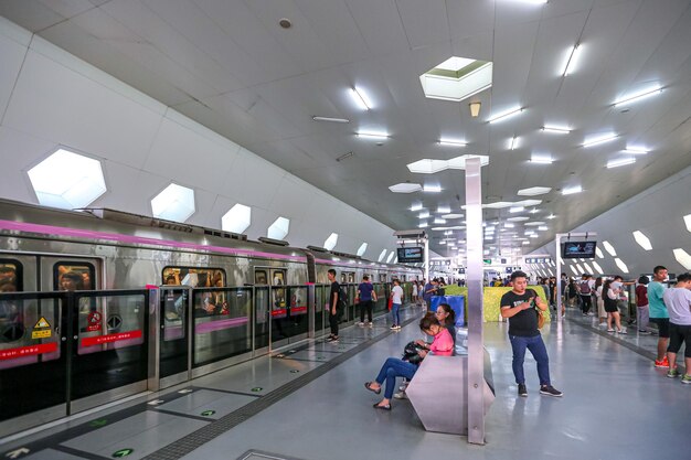 Subway station platform and passengers in Beijing