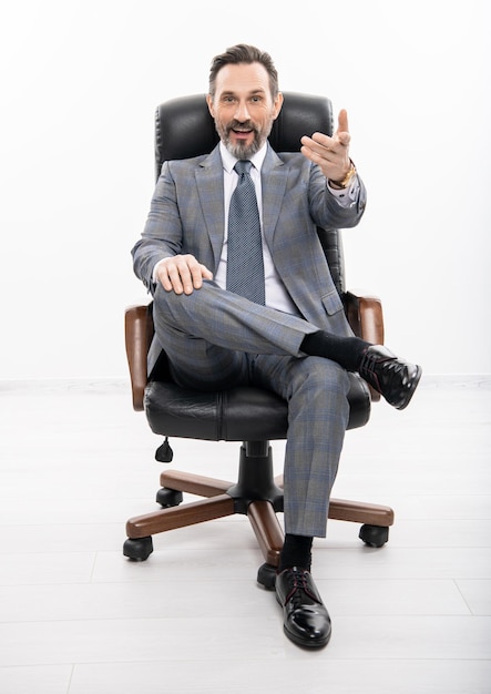 successful business man in office office manager boss isolated on white business boss in suit big boss welcoming businessman businessman at office chair business leadership and success