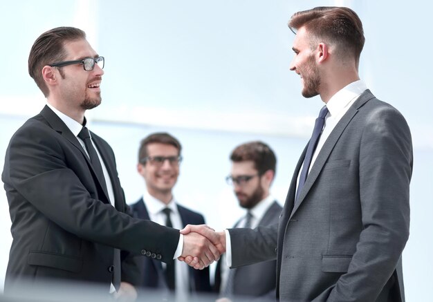 Successful business partners shaking hands