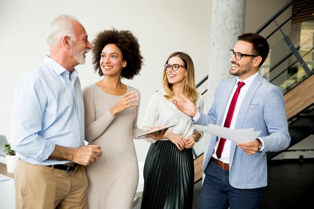 Successful business people standing in the office