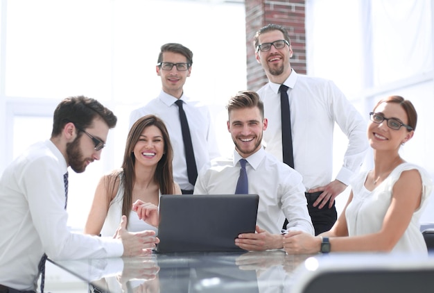 Successful business team at the Desk in the officethe concept of teamwork