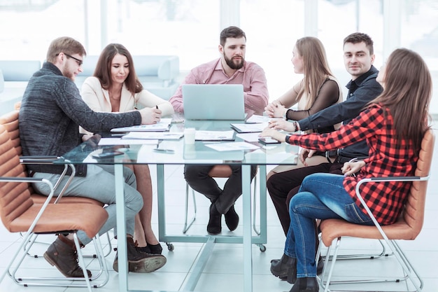 Successful business team holding a working session at the working place in office