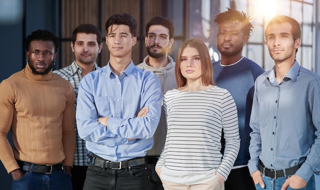 Successful business team smiling while standing in the office