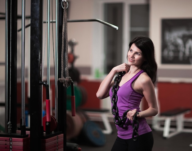 Successful business woman on the background of a modern gym