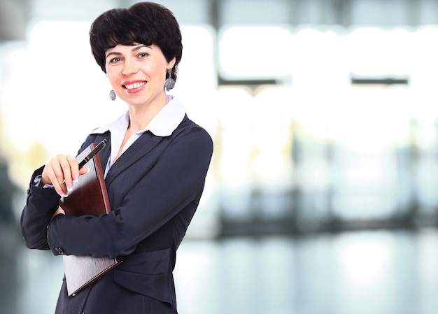 Successful business woman looking confident and smiling