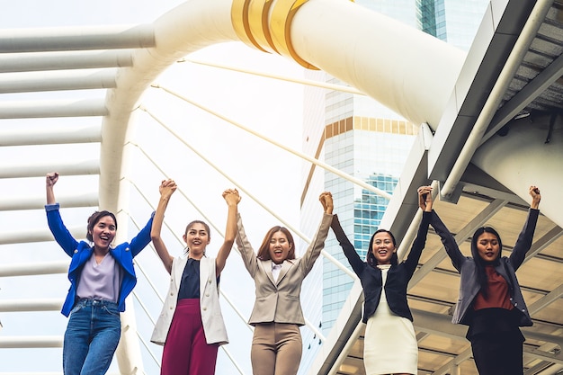 successful business woman team celebrating