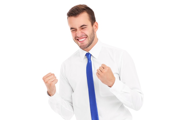 a successful businessman cheering over white background