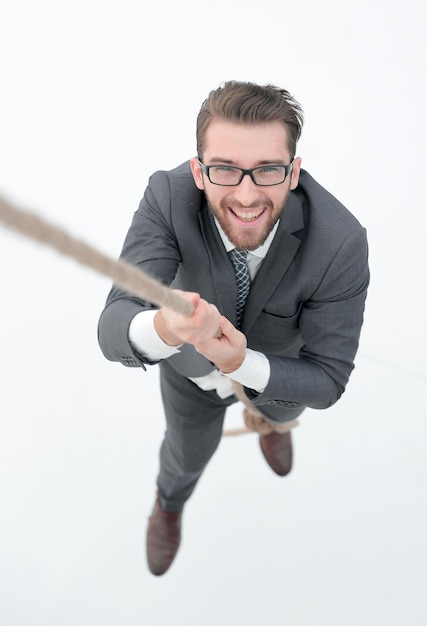 Successful businessman climbing the rope