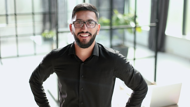 Successful businessman greets in the office shaking hands