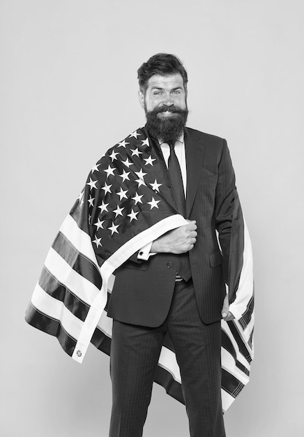Successful businessman lawyer or politician business people\
independence businessman bearded man in formal suit hold flag usa\
businessman concept means decide according to law and facts