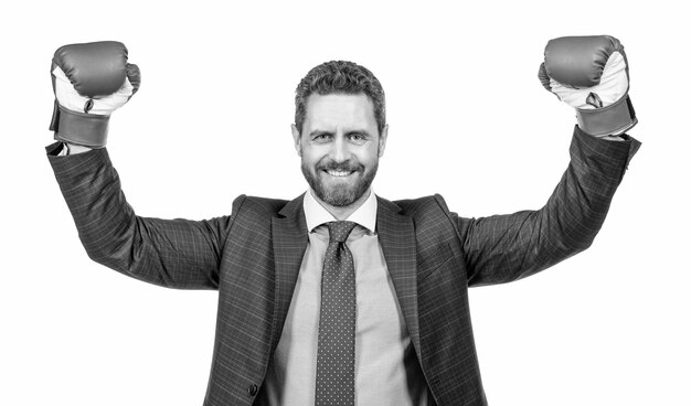 Successful businessman man in suit and boxing gloves celebrate success isolated on white success