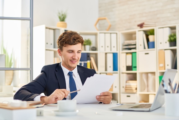 Successful Businessman Reading Documents