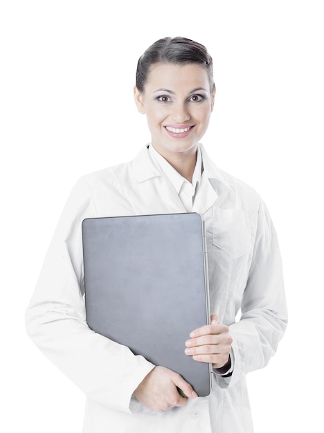 Successful female doctor with a laptop isolated on white