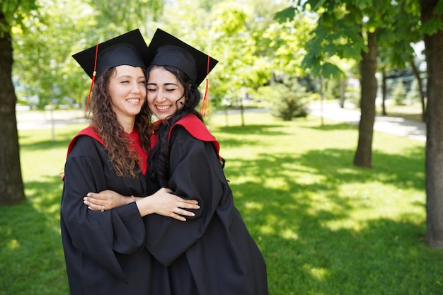 Successful graduates in academic dresses