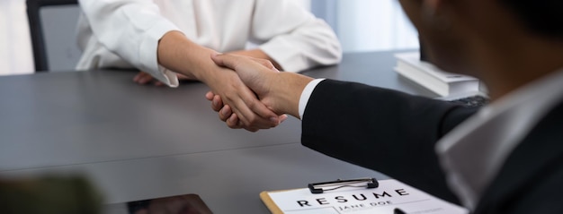 Successful job interview at business office end with handshake Prodigy