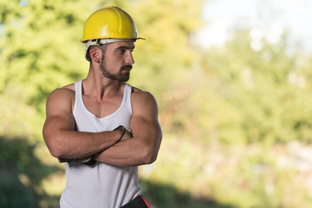 Successful Male Architect At A Building Site With Arms Crossed