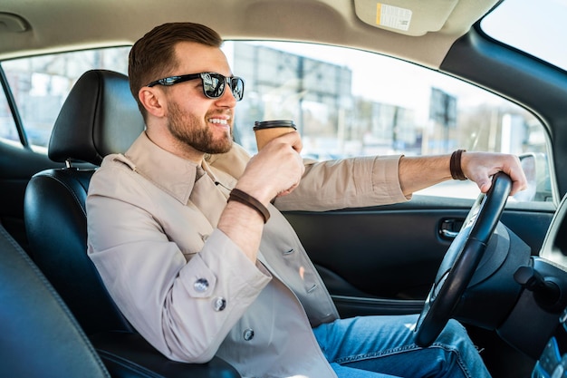 Successful man driving car