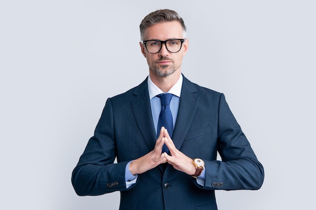 Successful mature man in formal suit wear eyewear