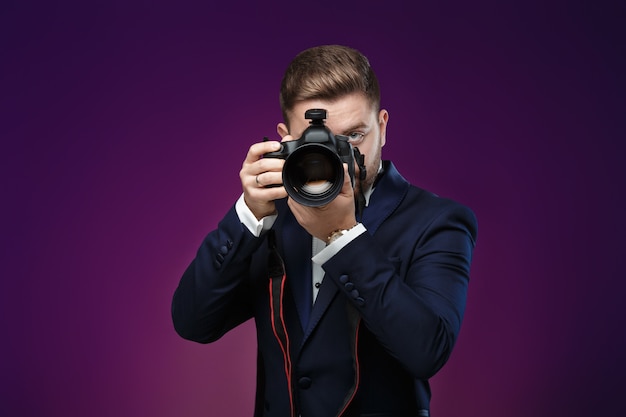 Successful professional photographer in tuxedo