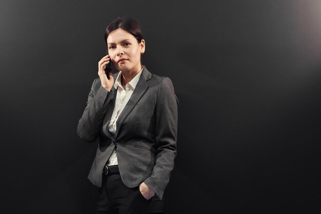 Successful sales manager talking by phone