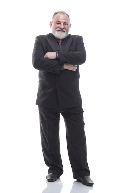 Successful senior businessman looking at the camera isolated on a white