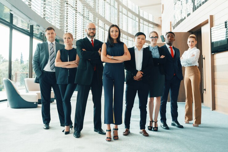 Photo successful team of young perspective businesspeople in office
