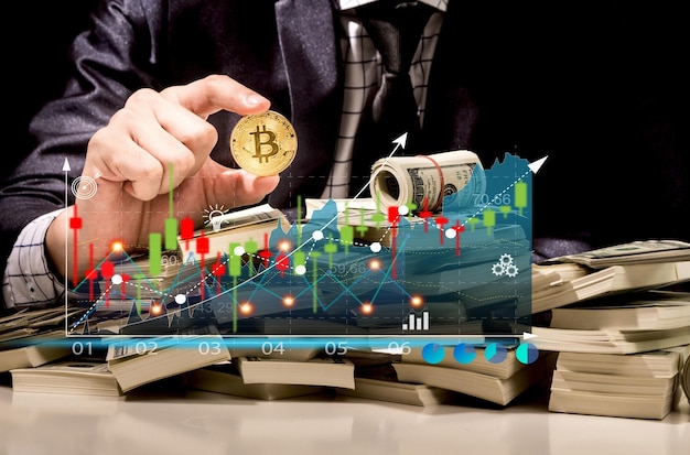 Successo di trader investitore uomo d'affari in possesso di bitcoin trading grafico denaro di blockchain mercato azionario investimento in criptovaluta vendita e acquisto con grafico dei dati del grafico dei prezzi