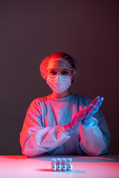 Successful vaccine development nurse applauding