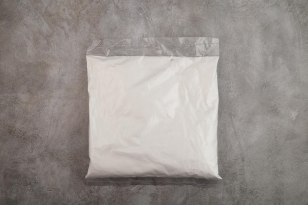 Succinic acid powder in plastic bag