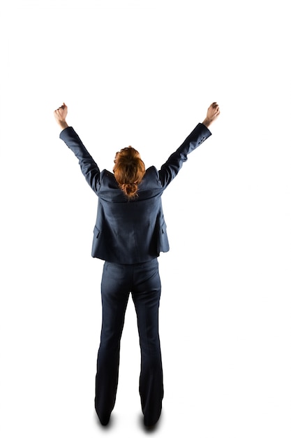 Sucessful businesswoman in suit cheering