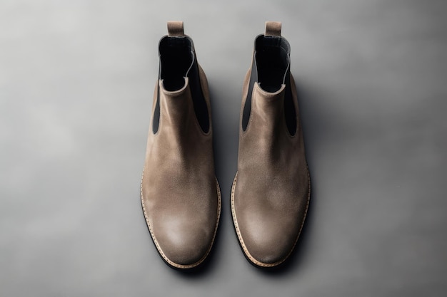 Suede brown women s chelsea boots on gray background top view