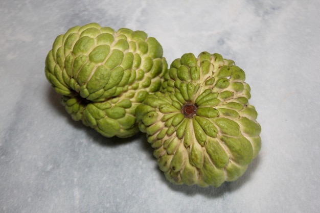 Sugar apple or custard apple or srikaya , isolated on white background.