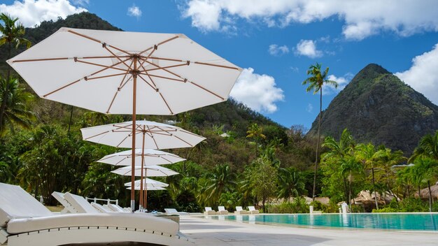 Sugar beach saint lucia white tropical beach palm trees and\
luxury beach chairs st lucia caribbean