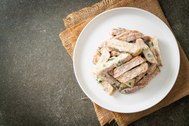 Sugar Coated Taro or Crispy Sweet Snow Taro on plate