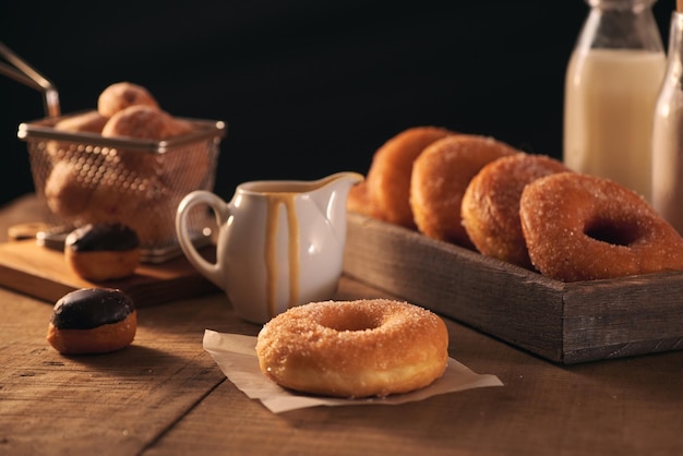 Sugar donuts with a glass of milk