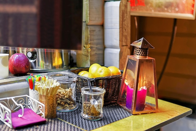 Sugar and other additional spices for hot drinks at the stall during the Christmas market in old Riga, Latvia. Selective focus