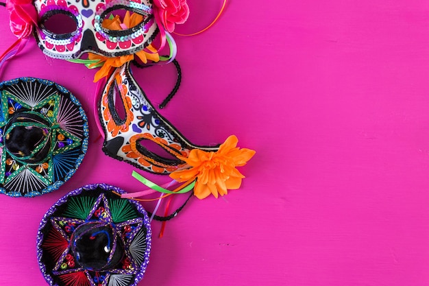 Sugar skull mask with flowers for Day of the Dead.