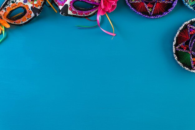 Sugar skull mask with flowers for Day of the Dead.